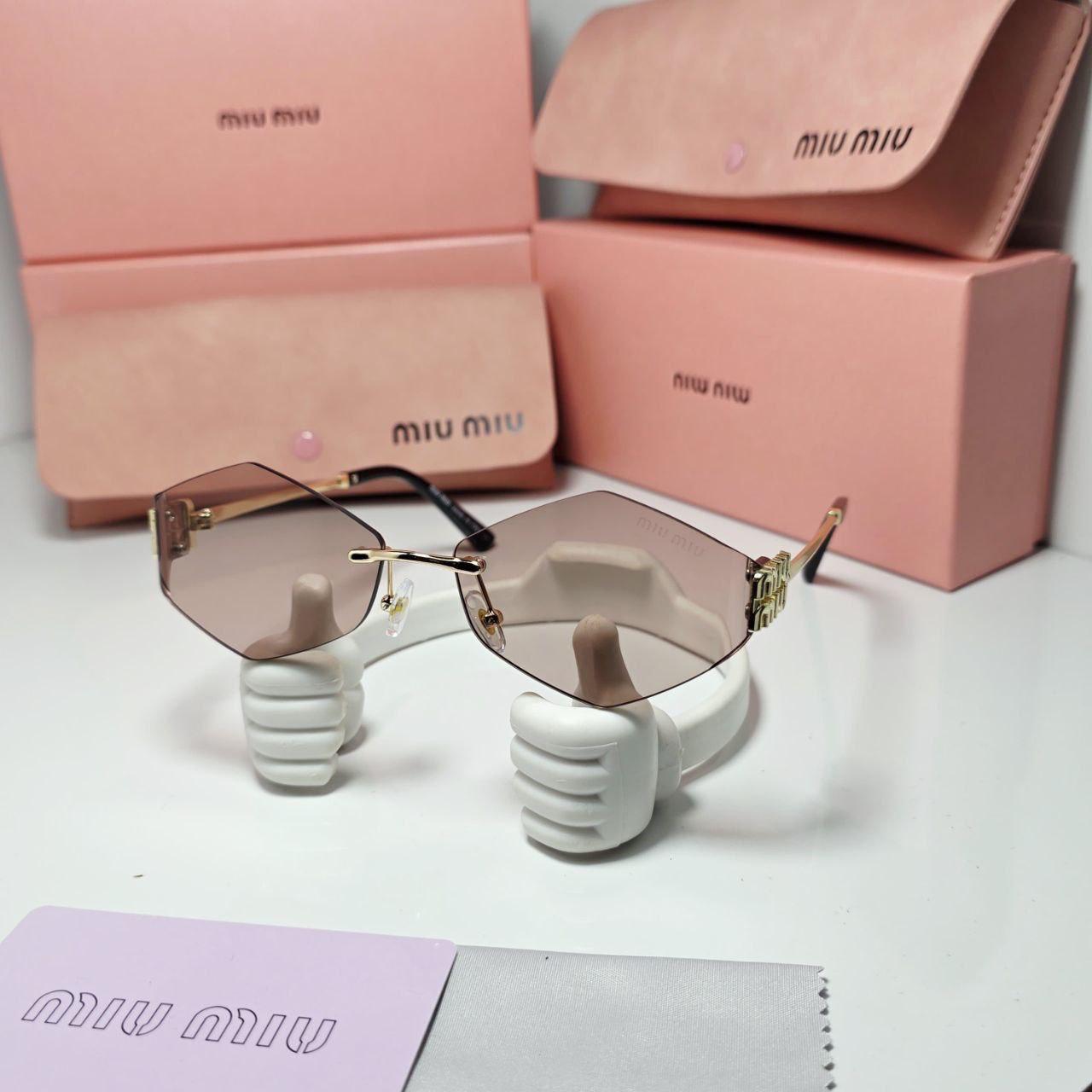 GAFAS MIUMIU ROMBO METAL